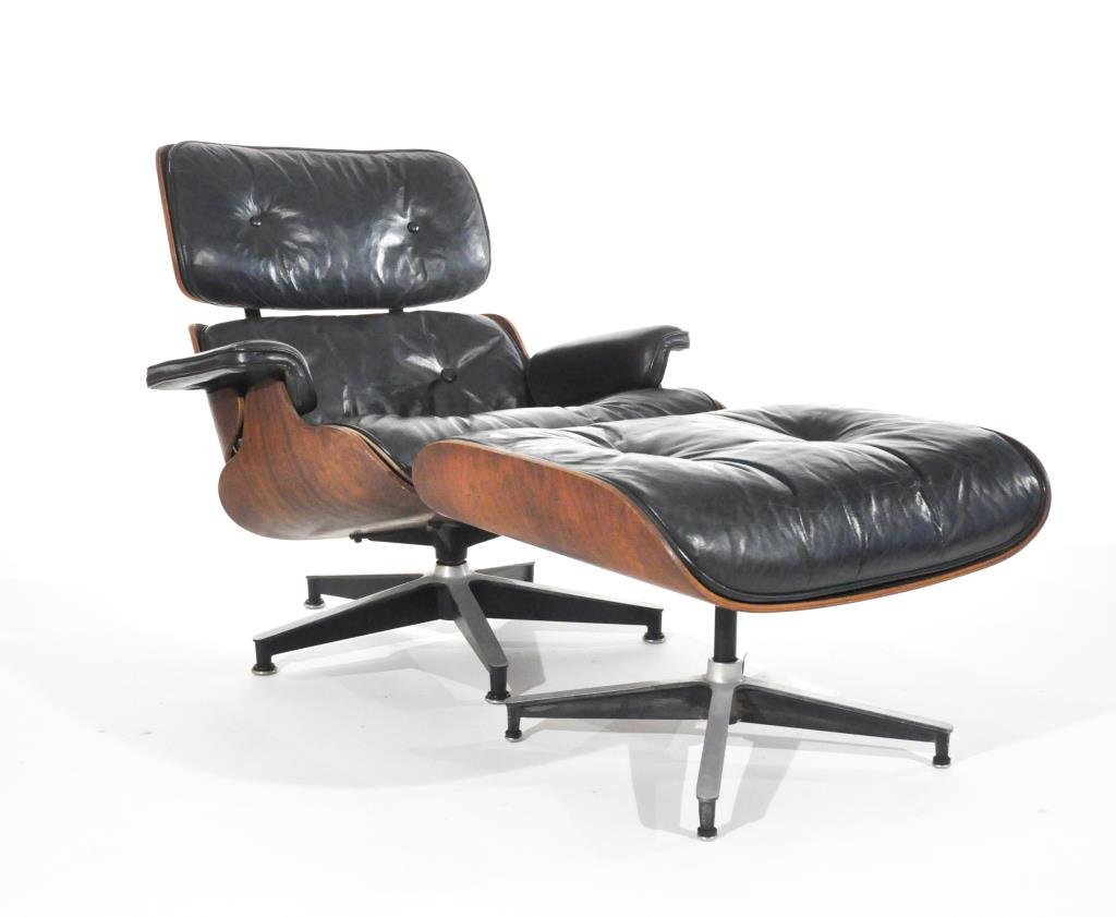 CHARLES & RAY EAMES LOUNGE CHAIR AND OTTOMAN: Model no. 670 & 671, rosewood, painted steel & aluminum, for Herman Miller, circa 1960s, manufacturers markings.Dimensions: H 31" x W 34" x D 34"Condition: Minor scuffs to seat, arm and ottoman cushio