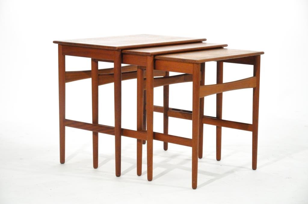 HANS WEGNER TEAK NESTING TABLES: Marked to bottom Andr Tuck, Design Hans Wegner, with Danish Control StampDimensions: H 19" x W 20.5" x D 13.5"Condition: Good, a small old chip to corner of largest table
