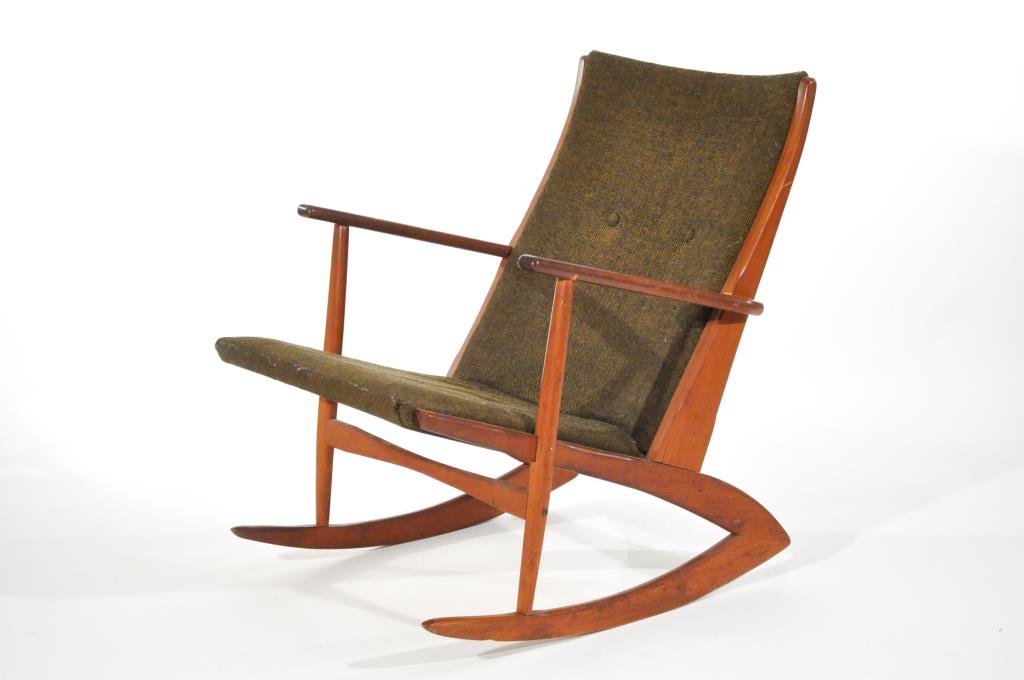 GEORG JENSEN KUBIS TEAK ROCKER: Kubus sticker on bottom reads: "Model 97 guarantee 09673 Georg Jensen DenmarkDimensions: H 30" X W 22" X D 31"Condition: Good, chip and crack to one rail, normal signs of use and age.