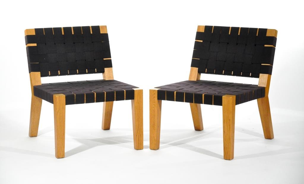 PAIR OF MID-CENTURY OVERSIZED OAK CHAIRS: Woth woven seating over a strong oak frame, nice setDimensions: H 31" x W 24" x D 31"Condition: Good