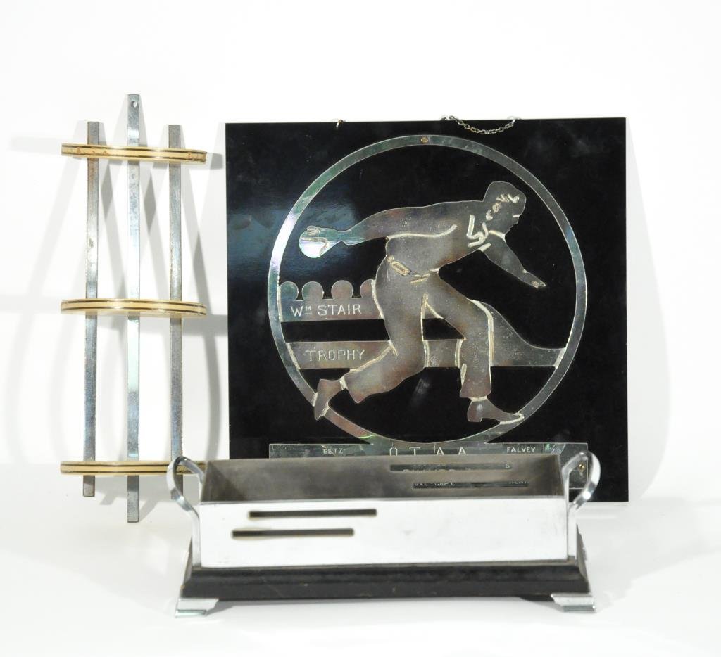 ART DECO CHROME GROUPING: Including bowling trophy, small shelf and planter. Dimensions: Trophy 12" squareCondition: good, light signs of use.