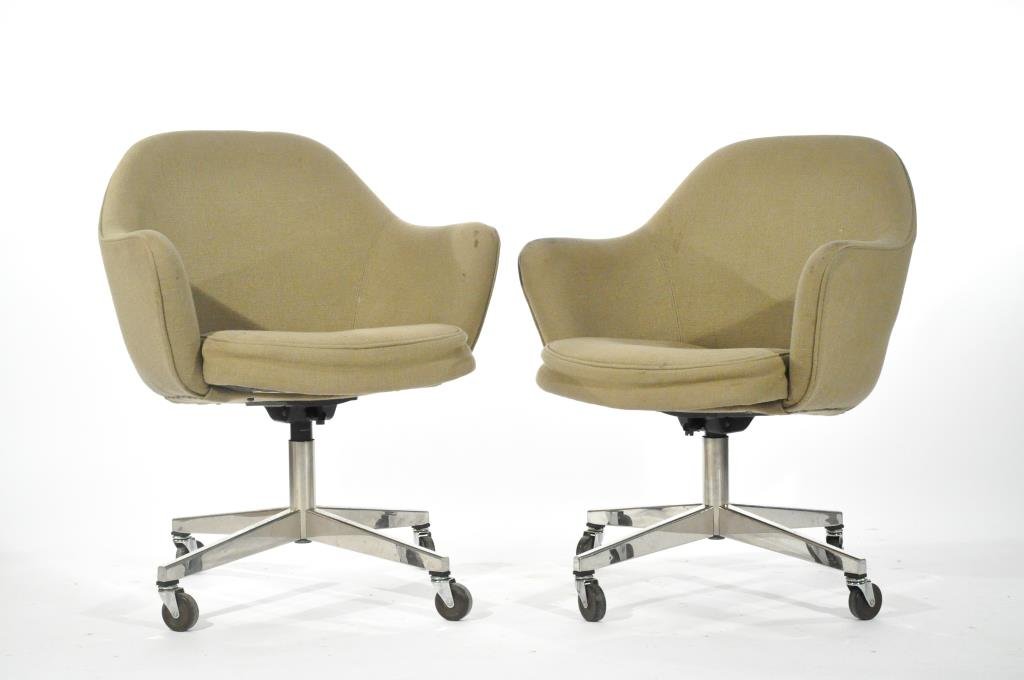 PAIR OF EERO SAARINEN OFFICE CHAIRS: For Knoll, with label to bottomDimensions: H 33" x W 27" x D 25"Condition: Staining to fabric