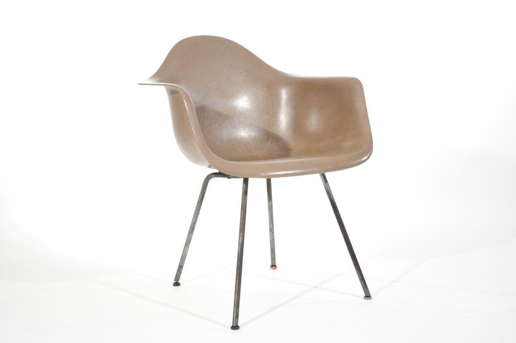 CHARLES & RAY EAMES ROPE EDGE ARMCHAIR: Circa 1950s, for Zenith/Herman Miller, plastic reinforced fiberglass and zinc-plated steel, with decal label Dimensions: H 30" X W 25" X D 23" Condition: good vintage condition, no breaks or repairs