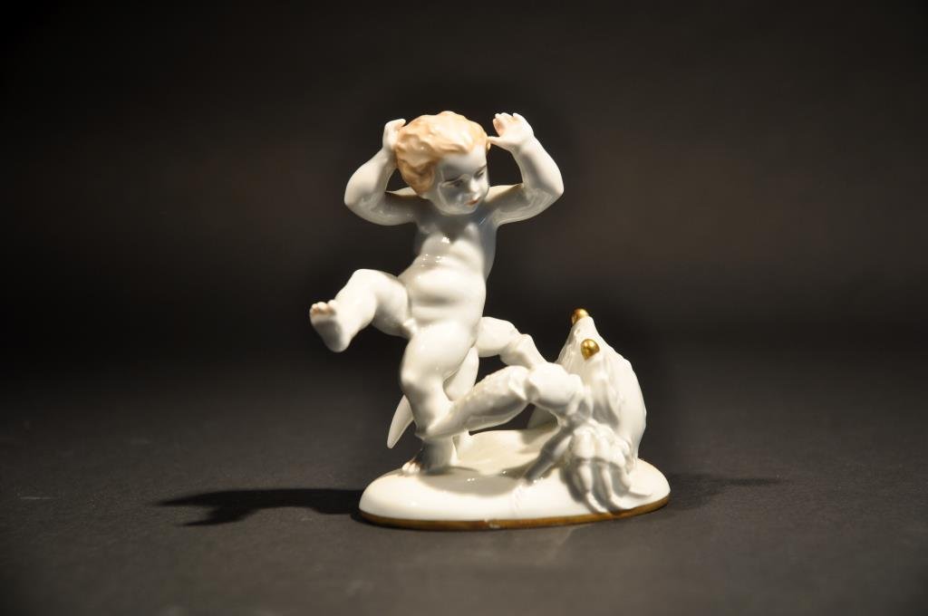 ROSENTHAL PORCELAIN FIGURE: Marked to bottom Rosenthal Bavaria, R Forster, depicting a crab biting a boy. Modeled by Richard Forster. Dimensions: H 4.5" x W 2" x D 4.5" Condition: good
