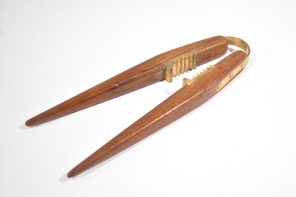 CARL AUBOCK TEAK & BRASS NUTCRACKER: Dimensions: L 9" x W 2.5" Condition: Good