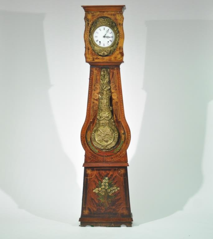 FRENCH MORBIER STYLE TALL CASE CLOCK: Highly detailed with porcelain face, Roman numerals and shields. Handpainted case with worm holes. Gilt metal surround and pendulum with grapes and wheat. Has original key. Dimensions: H 88" x W 22" x