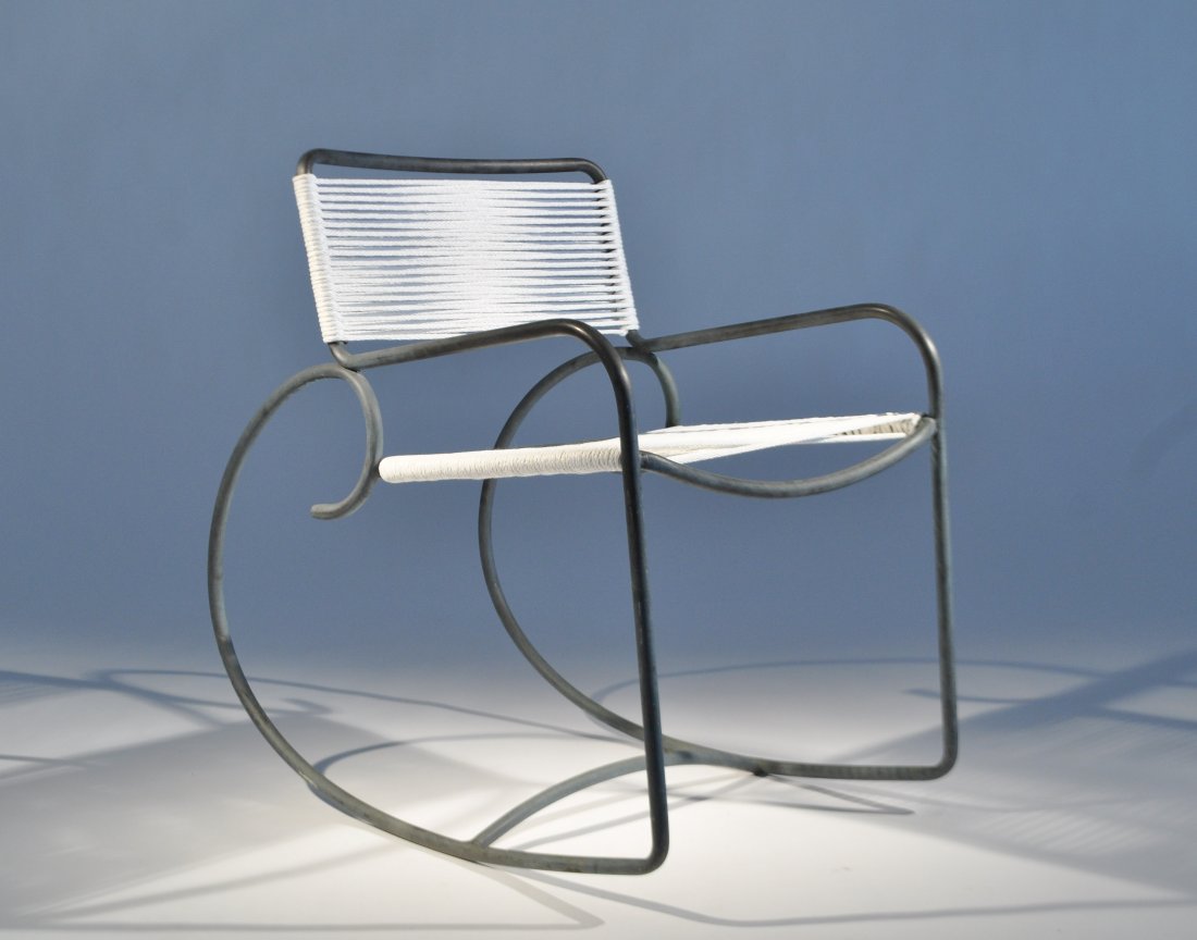 WALTER LAMB BRONZE ROCKING CHAIR: Cast bronze frame, cord seat, design circa 1950, for Brown JordanDimensions: H 32" x W 21" x D 32"Condition: very good, seat has been restrung