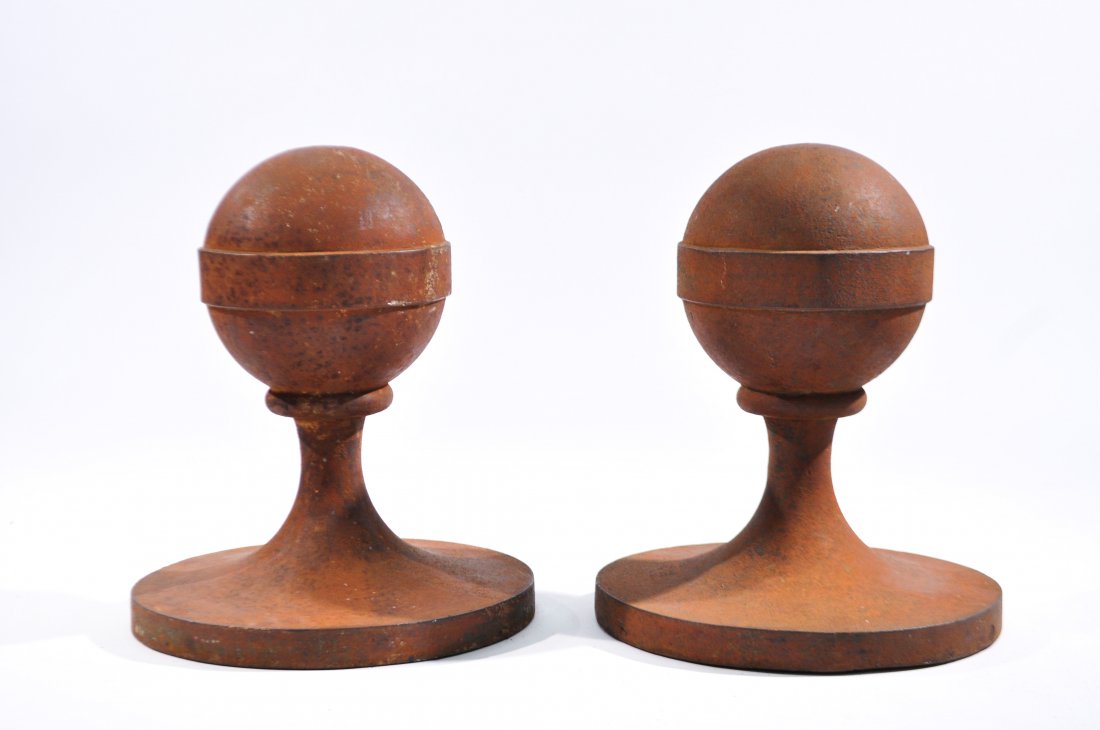 PAIR OF ROUND CAST IRON DECORATIONS: Dimensions: H 16.5" x D 13.5"Condition: GoodShipping note: VERY HEAVY, SOLID IRON
