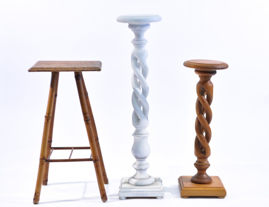 TWO CARVED WOOD PEDESTALS AND BAMBOO TABLE: Two pedestals with Italian label and bamboo table has John label under. Dimensions(White): H 38" x W 9.5" x D 9.5"Dimensions (Natural): H 28.5" x W 9.5" x D 9.5"Dimensions (Bamboo): H 28.25" x W 14.5"