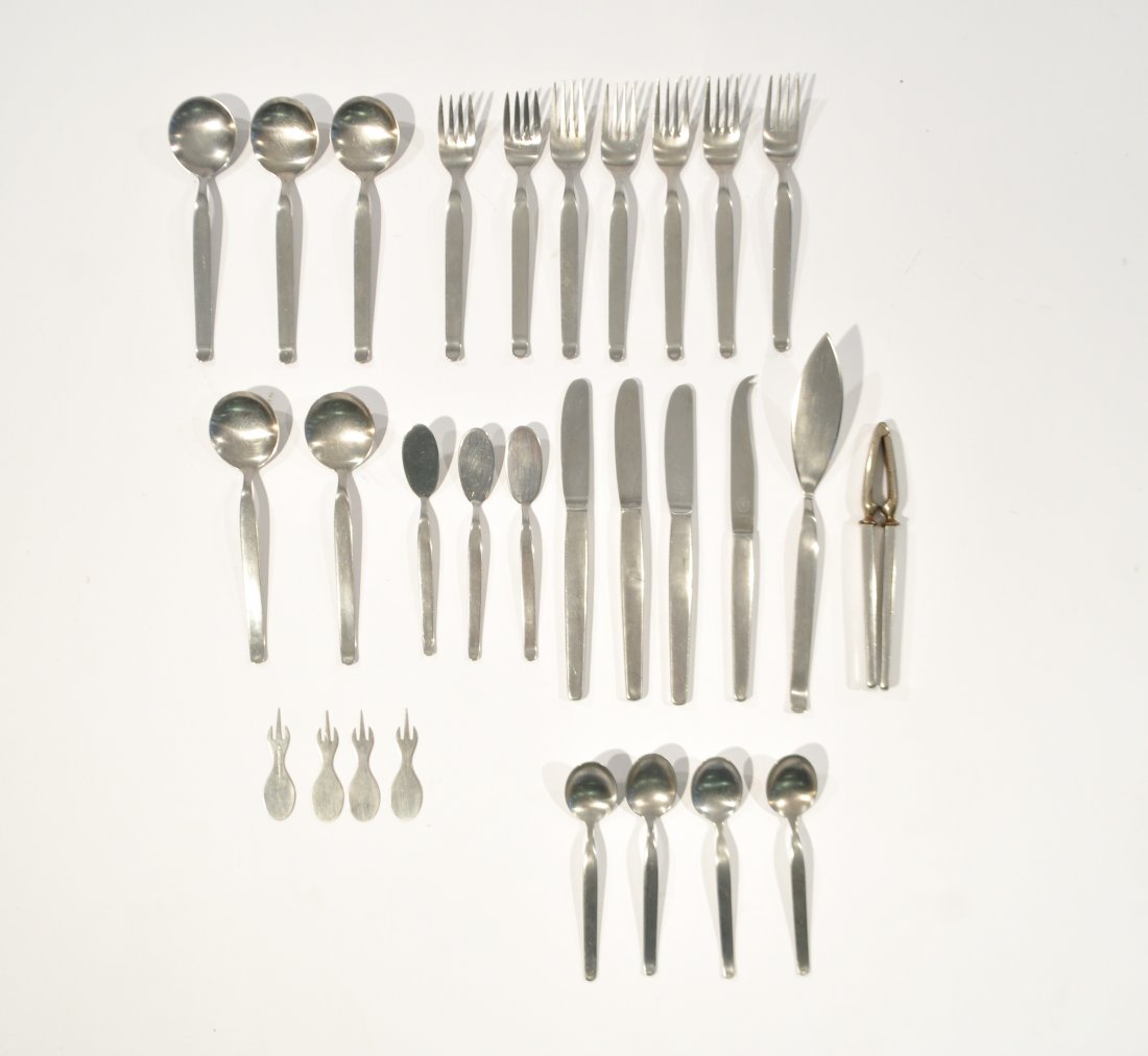 C. HUGO POT NICKELED CHROME GERMAN FLATWARE: 2 salad forks, 5 dinner forks, 4 teaspoons, 5 soup spoons, 3 pate spreaders, 3 butter knives, 4 h'ouevres servers, 3 misc. serving pieces, Also including 8 misc. flatware pieces (not pictured, incl. D