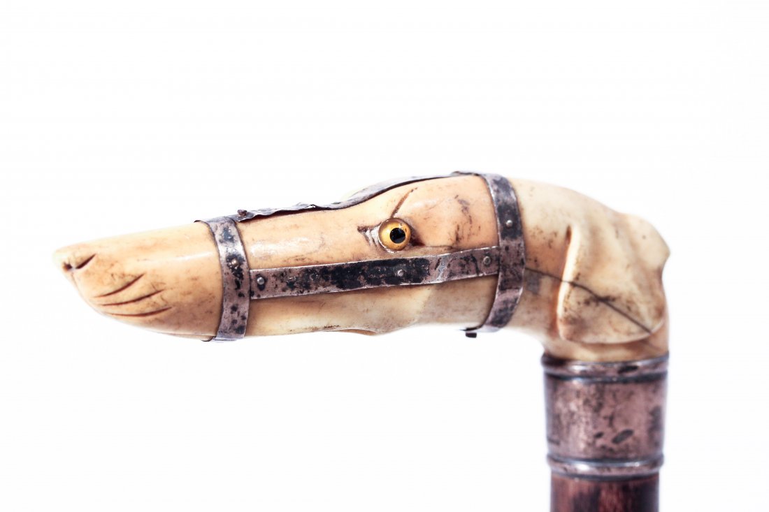 CARVED GREYHOUND DOG HEAD CANE W/ STERLING: Marked Sterling on CollarDimensions: H 7" x W 4.5" x D 1"Condition: good, some hair lining, loss to one ear