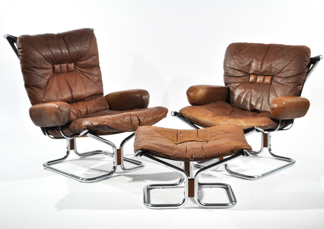 2 INGMAR RELLING, WESTNOFA LOUNGE CHAIRS & OTTOMAN: Dimensions: H 34" x W 30" x D 34"Condition: good, age appropriate wear to leather