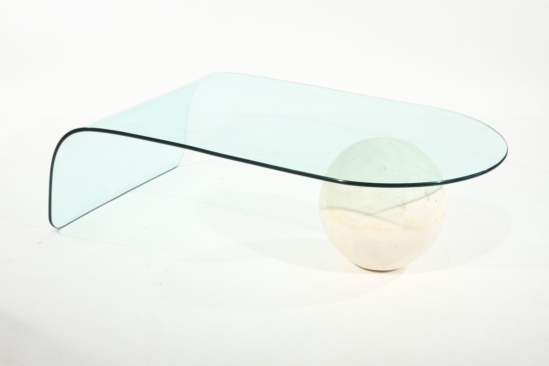 STYLE OF MASSIMO VIGNELLI, COFFEE TABLE: Italy, 1970s or 80s, Cured and tempered glass, painted composite sphere, unsignedDimensions: H 15.5" x W 30" x D 52"Condition: A few light scuffs to glass and base. Very good overall condition.