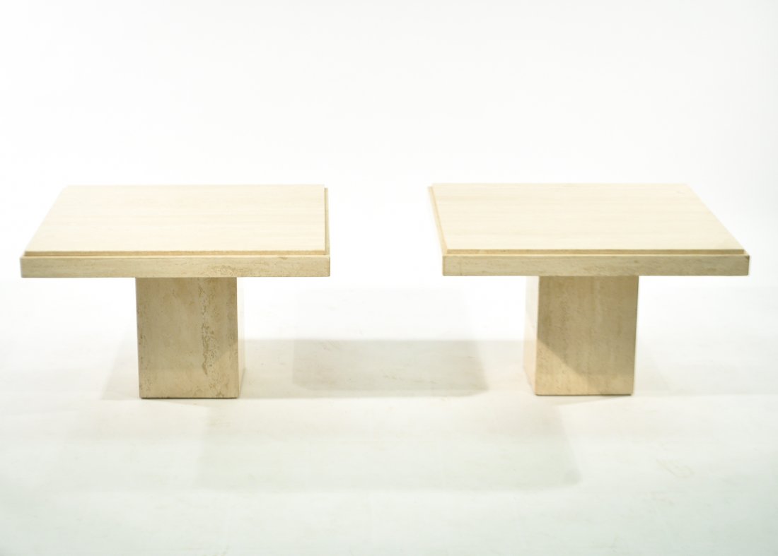 PAIR OF ITALIAN TRAVERTINE MARBLE SIDE TABLES: 1980, solid travertine, unsignedDimensions: H 18" x W 28.5" x D 28.5"Condition: Light normal wear. Very good condition.