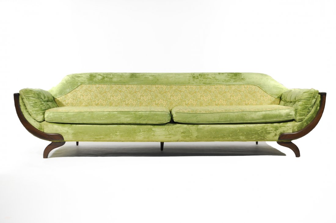 MID-CENTURY LONG SOFA IN THE MANNER OF PEARSALL: Adrian Pearsall Style, Long low sofa, USA, 1960?s, Upholstery and stained wood, unsignedDimensions: H 28" x W 84" x D 36"Condition: Fabric is very clean because it was in a plastic covering for many y