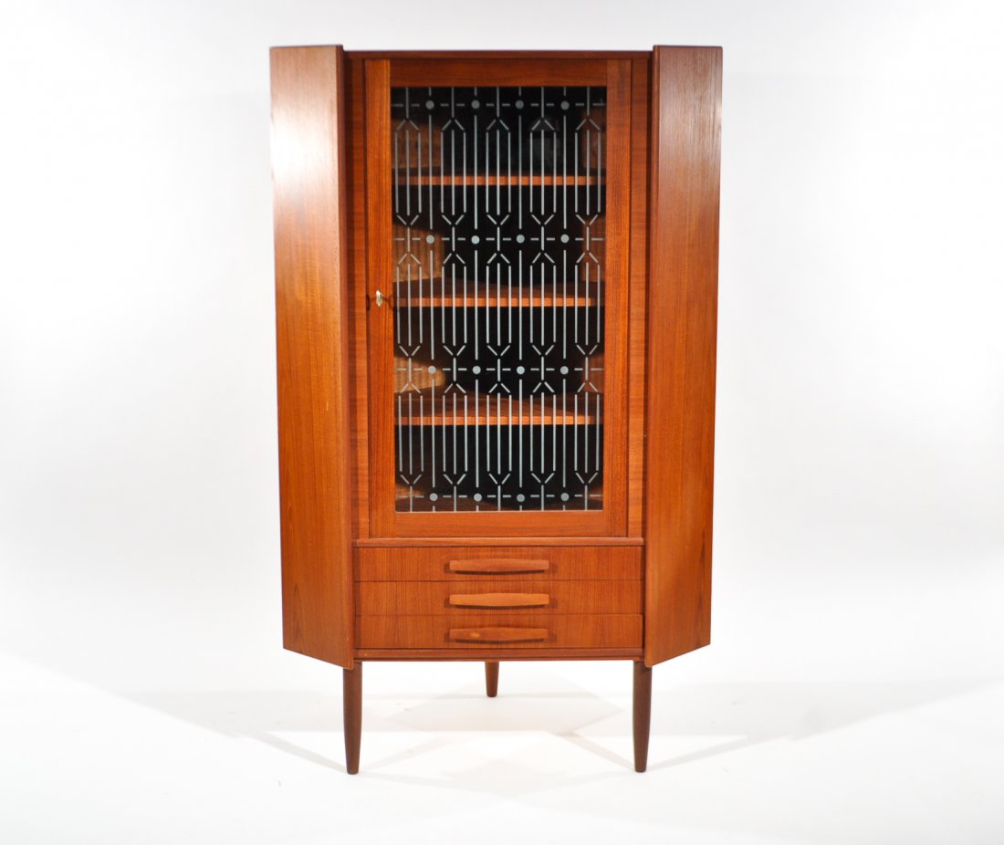 DANISH MODERN TEAK CORNER CABINET: Stamp to inside cabinetDimensions: H 58" x W 25" x D 22.5"Condition: good