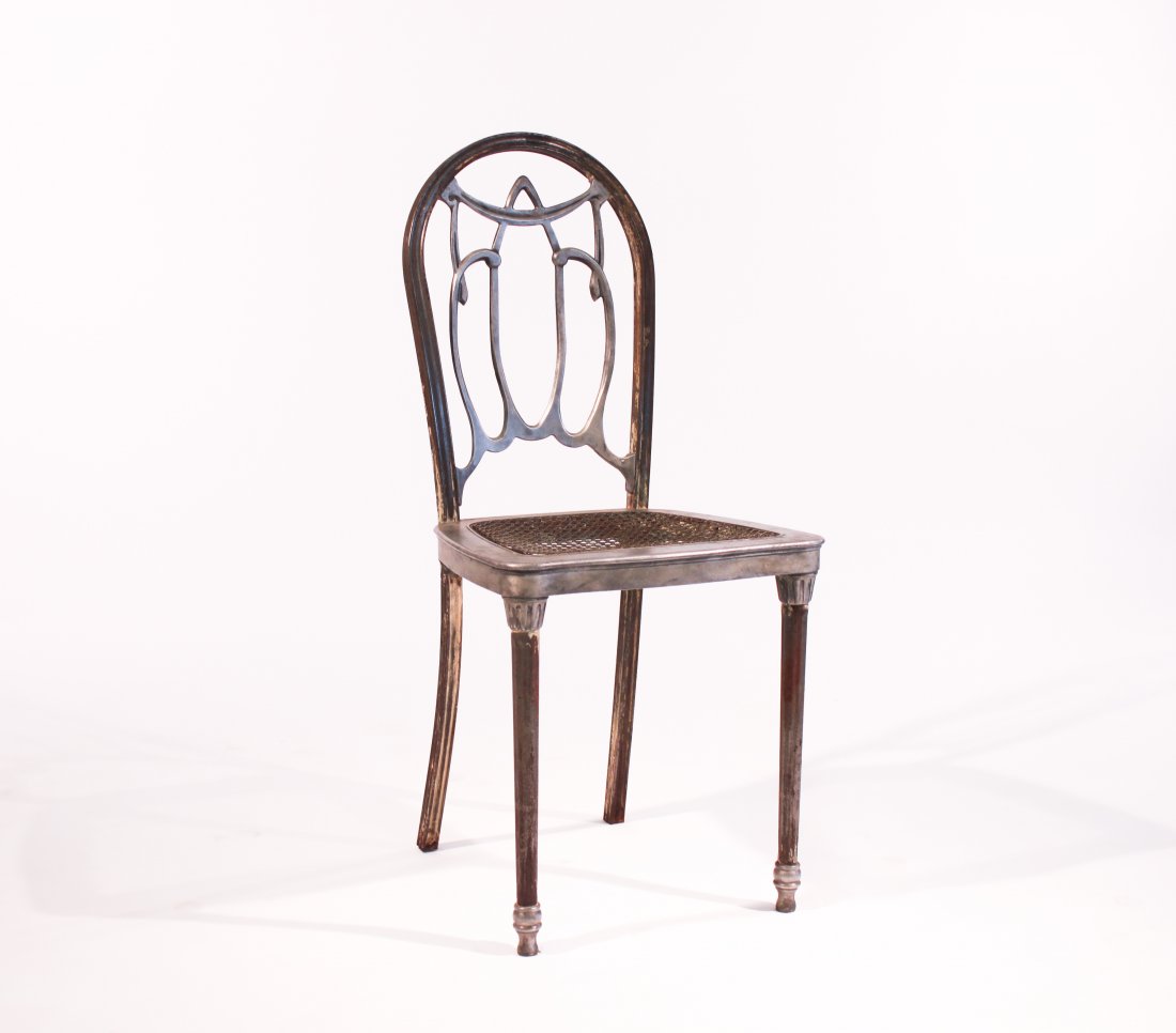 ART NOUVEAU STEEL CHAIR WITH CANED BRASS SEAT: Dimensions: H 36" x W 14.5" x D 16"Condition: good, losses to paint, some rust
