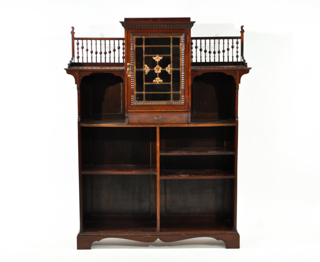 ENGLISH ARTS AND CRAFTS CABINET BOOKCASE: Of Moroccan Influence with glass cabinet and copper accents, spindle decorationDimensions: H 62" x W 48" x D 14"Condition: good, very light wear to surface from use