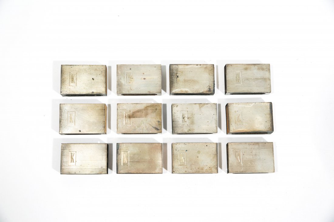 (12) ART DECO STERLING SILVER MATCH COVERS: Dimensions: H 1.5" x W 1" x D 0.5"Condition: good, some with original insertsProvenance: Arthur and Joe Robinson Collection, Harrison, New York.