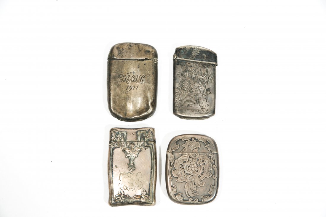(4) ART NOUVEAU STERLING SILVER MATCH SAFES: Dimensions: H 2.5" x W 1.5"Weight: 3.845 oztCondition: goodProvenance: Arthur and Joe Robinson Collection, Harrison, New York.