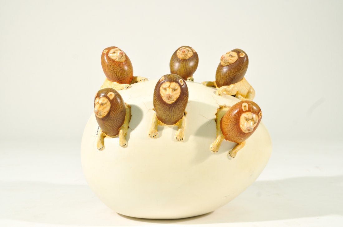 SERGIO BUSTAMANTE CERAMIC EGG LION SCULPTURE: With Lions, signed to the leftDimensions: H 9.5" W 10.5" D 8"Condition: good, no breaks, some surface scuff lines on paint