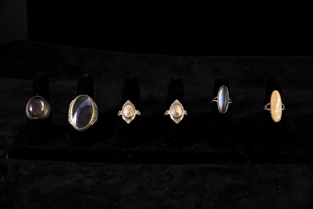(6) NATURAL STONE & STERLING SILVER RINGS: Including (left to right): Men's Mexican sterling and rock quartz ring, Men's sterling and agate ring, 2 ladies sterling and abalone rings, ladies sterling Native American ring, ladies sterling and mo
