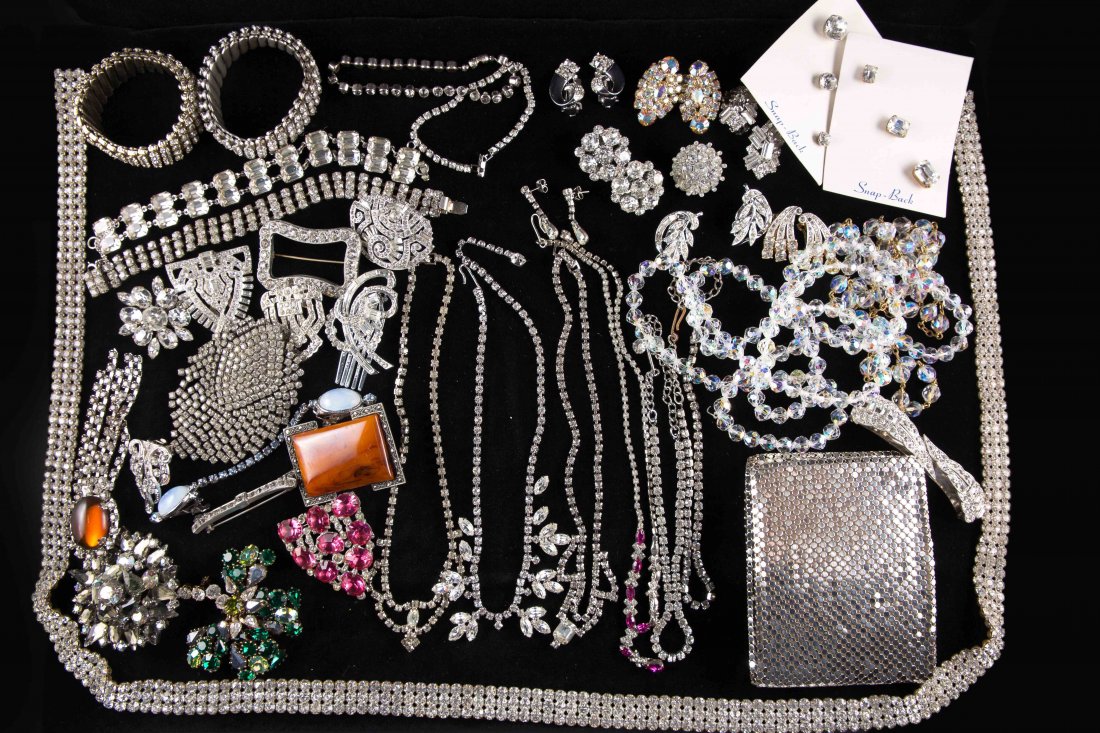 ART DECO RHINESTONE JEWELRY LOT: All older rhinestones in good condition incuding: Whiting and Davis wallet, three row rhinestone lariat, cut borealis crystal necklaces, Austrian crystal four leaf clover, barrette, sweater clips, pin