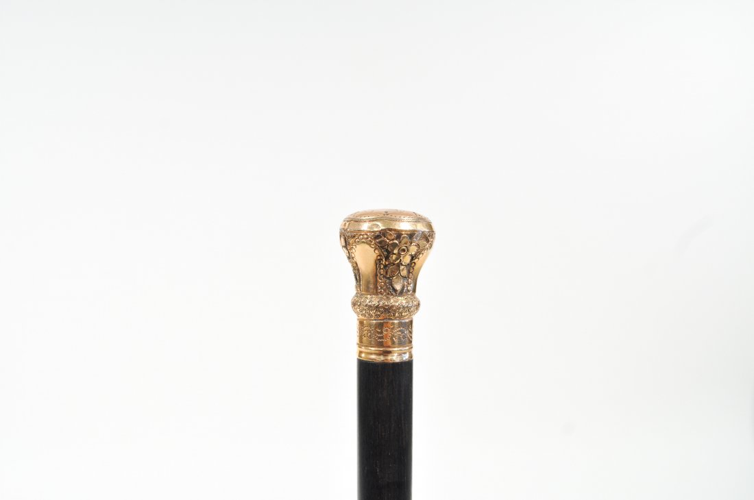 14K GOLD HANDLE CANE OR WALKING STICK: Circa 1884Dimensions: H 21.5" x Diameter 1"Condition: topper is good, cane has broken and is incomplete