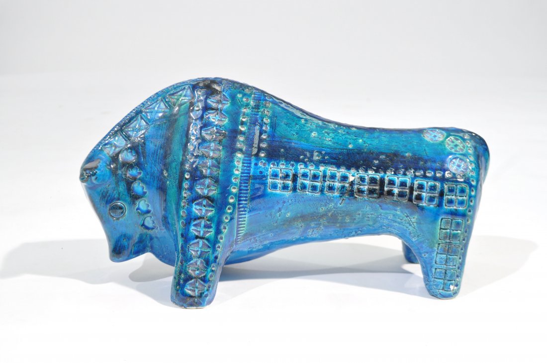 RIMINI BLUE CERAMIC BULL BY ALDO LONDI FOR BITOSSI: Marked ItalyDimensions: H 6.5" x W 13" x D 6"Condition: Good; some small chips to finish