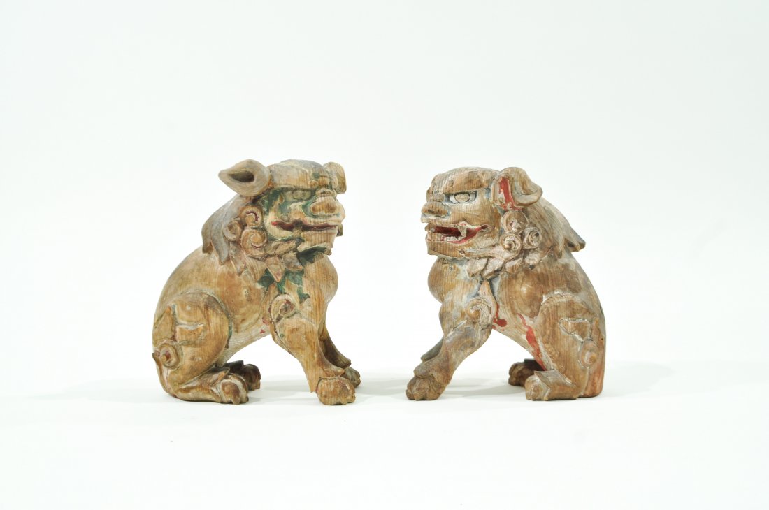 PAIR OF WOODEN PAINTED FOO DOGS: Dimensions: H 7.5" x W 7" x D 3"Condition: good, small chips scattered, losses to paint, repair to foot