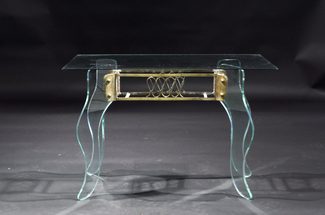 PIETRO CHIESA (ATTR); FONTANA ARTE COFFEE TABLE: For Fontana Arte, glass and brassDimensions: H 19" x W 29" x D 15"Condition: good, some small fleck chips to glass, two legs have chips around edges