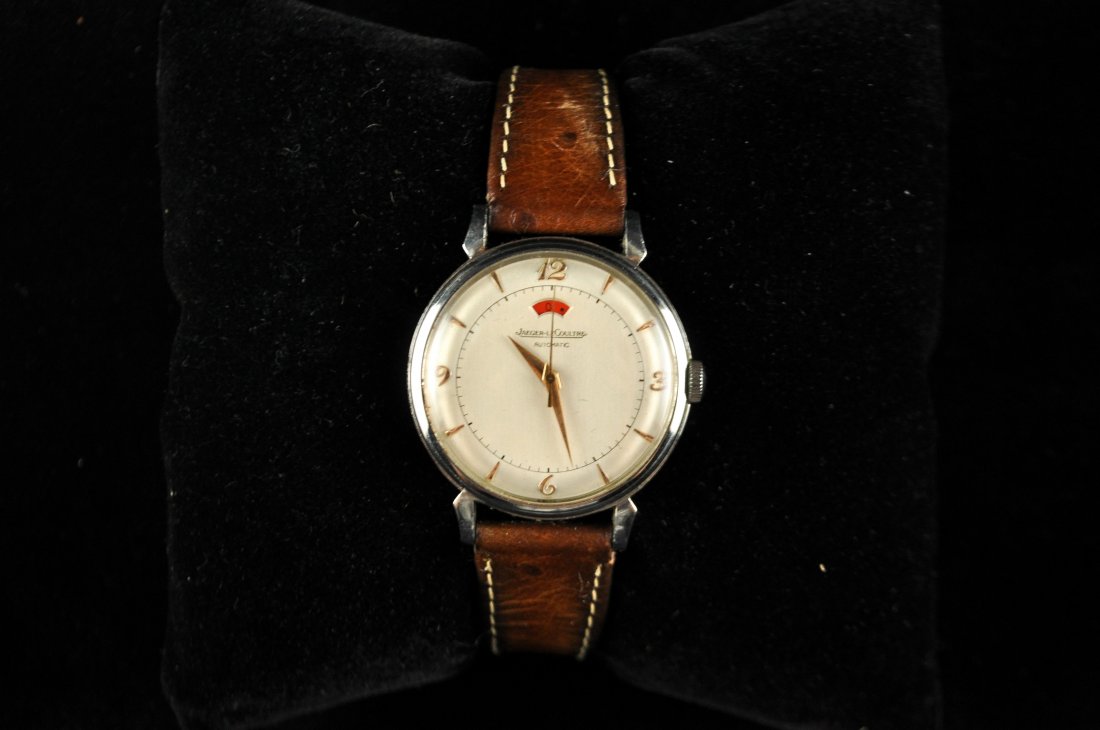 JAEGER LECOULTRE MENS WATCH: C. 1998, white dial. Comes with original purchase receipt and storage bag. Dimensions: Face: 33mmCondition: Good, used, running. Movement loose inside.