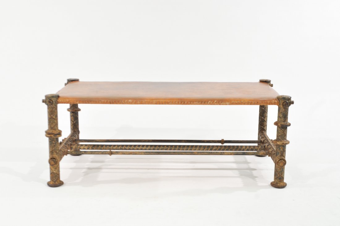 ILANA GOOR LEATHER TOP BENCH: Exceptional hand sculpted bench by internationally recognized artist Ilana Goor, Israel, c. 1988. In iron rebars and hand stitched caramel saddle leather. A museum piece.Dimensions: H 16" x W 41" x D 