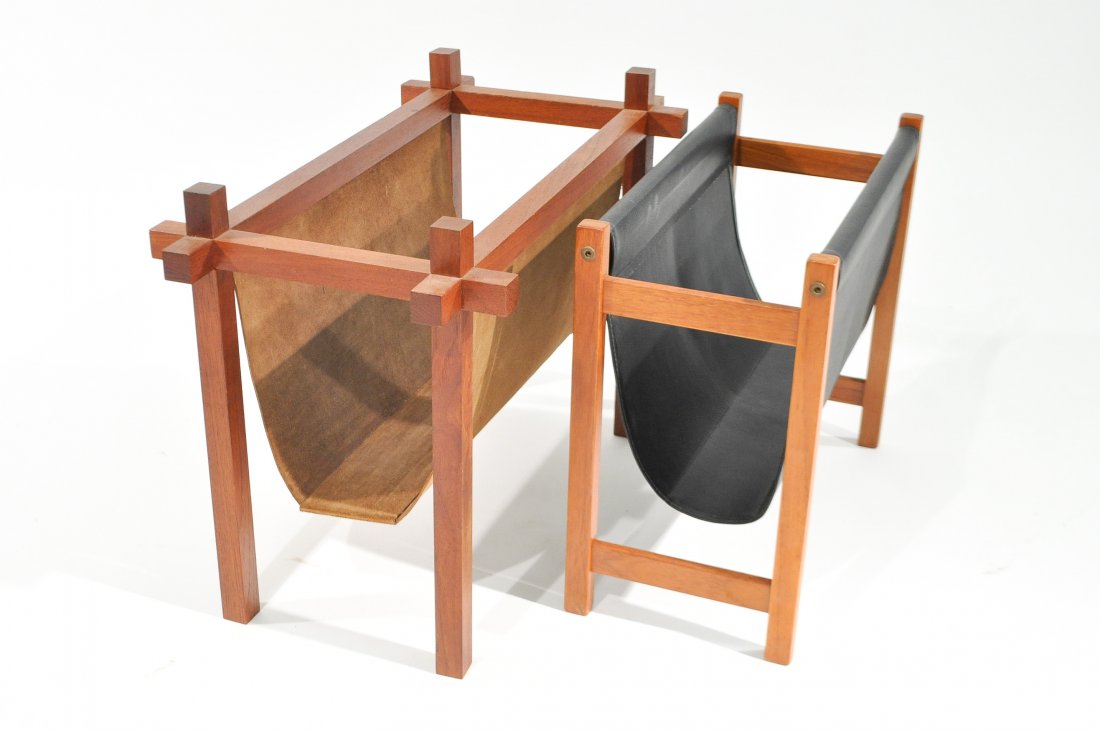 (2) MID-CENTURY MAGAZINE STANDS: Dimensions: H 18" x W 24" x D 13"Condition: black leather stand is good, tan leather has some areas of discoloration and wood is stained unevenly