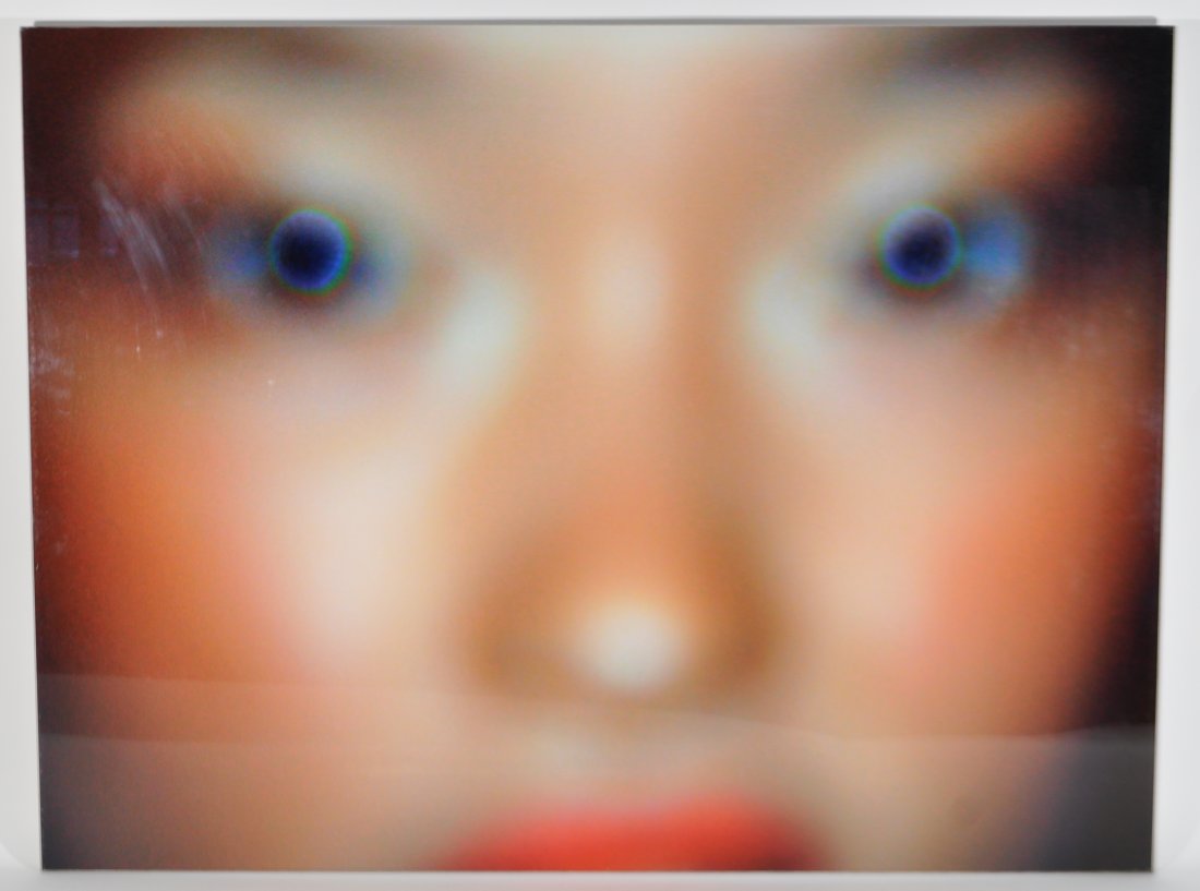 20TH/ 21ST CENTURY COLOR PHOTOGRAPH: Untitled (out of focus portrait of a female face.)Color Photographic print mounted on plexiglass, not signed.Dimensions: H 30" x W 40"Condition: good