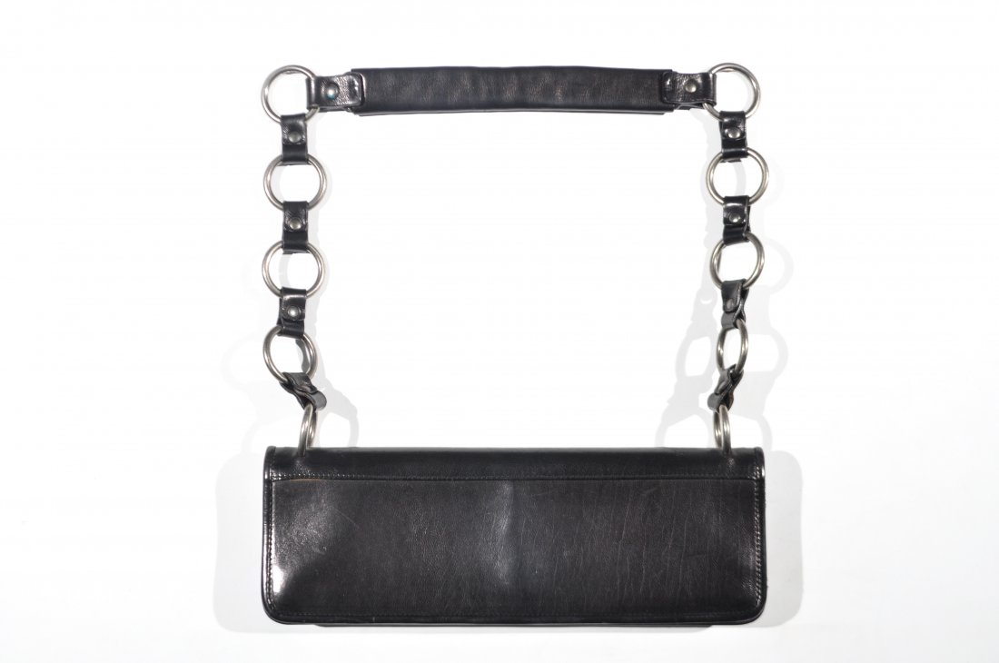 YVES SAINT LAURENT LEATHER PURSE: Dimensions: W 12" x Drop: 17"Condition: Good, used with lipstick marks inside.