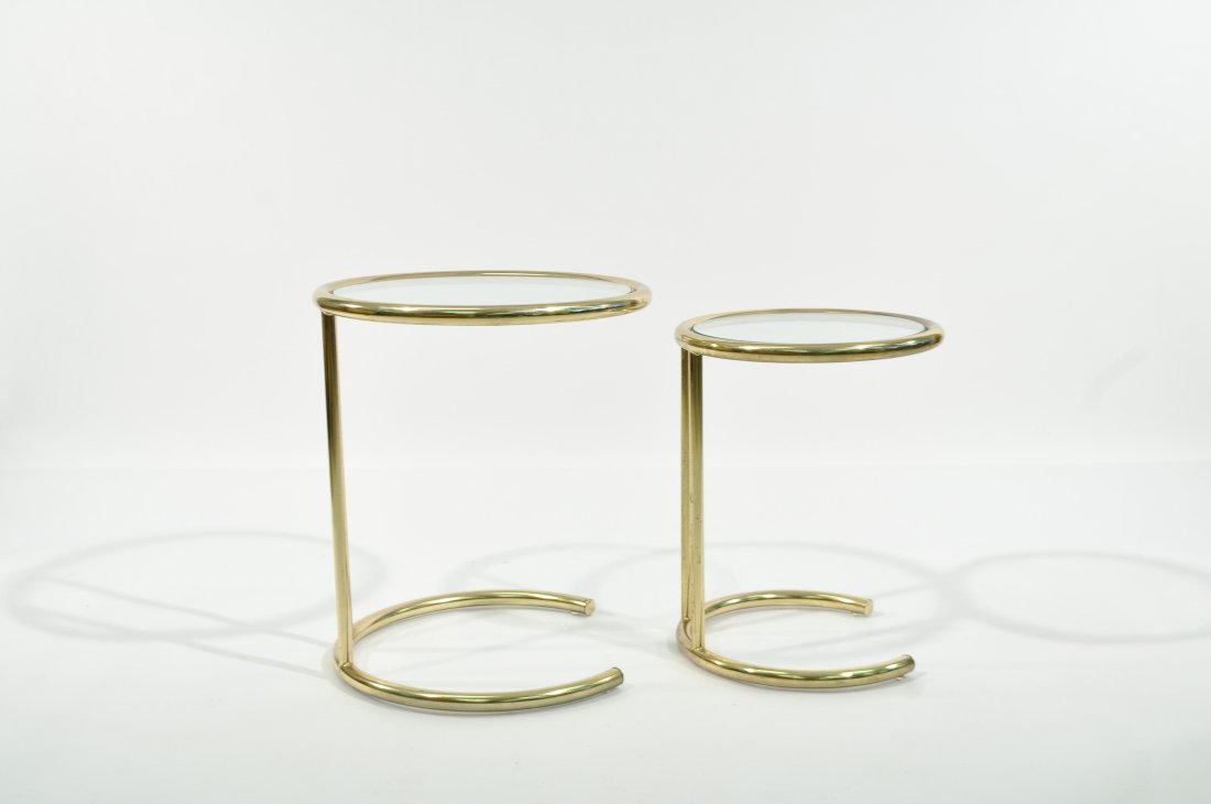 MID-CENTURY GLASS AND BRASS NESTING TABLES: Dimensions: H 21.5" x Diameter 18.5"Condition: good loss to finish on brass glass is good