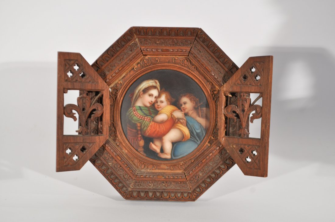EARLY 20TH CENTURY PORCELAIN MADONNA & CHILD: Italian porcelain plaque Madonna and Child after Raphael, carved wood frame, marked on the verso with Fleur de Lis Firenze.Dimensions: Frame: D 6.75" Sight: 3.75"Condition: Good, repair to the frame.