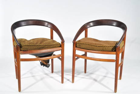 H. BROCKMANN-PETERSEN; PAIR OF ARMCHAIRS: Pair of armchairs in teak, original P. Jeppesen mfg label to bottom of one, both impressed with George Tanier stampDimensions: H 30" x W 22" x D 20"Condition: one chair needs restoration to joints,