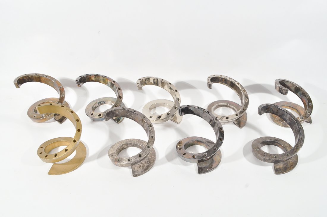 BERTIL VALLIEN; GROUPING OF DANSK CANDLESTICKS: 6 produced in France, 2 in Japan, 1 in China Dimensions: H 5" x Diameter 5" each Condition: good, tarnishing and finish wear