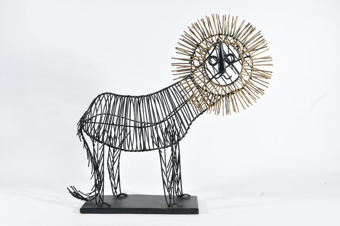 METAL LION SCULPTURE IN THE MANNER OF JERE: Dimensions: H 16" x W 16" x D 4" Condition: good