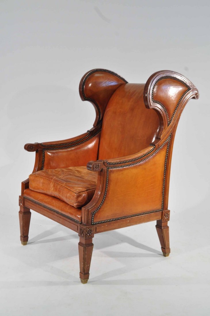 CARAMEL LEATHER WINGBACK LOUNGE CHAIR: Dimensions: H 47" x W 28" x D 35" Condition: overall good, some wear from use