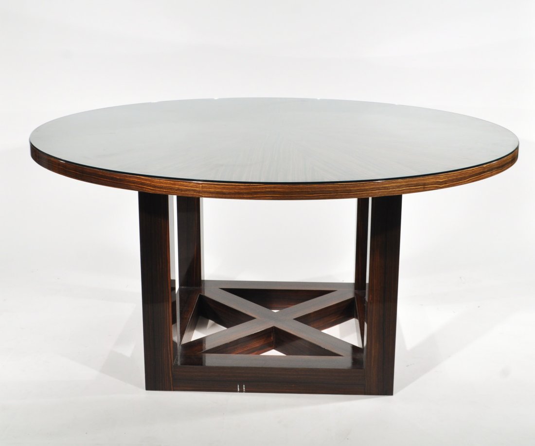 JOHN HUTTON (ATTR.) MACASSAR EBONY DINING TABLE: USA, 2000s, unmarked, macassar ebonyDimensions: H 30" x Dia. 60"Condition: very good, some small bumps to edge of top