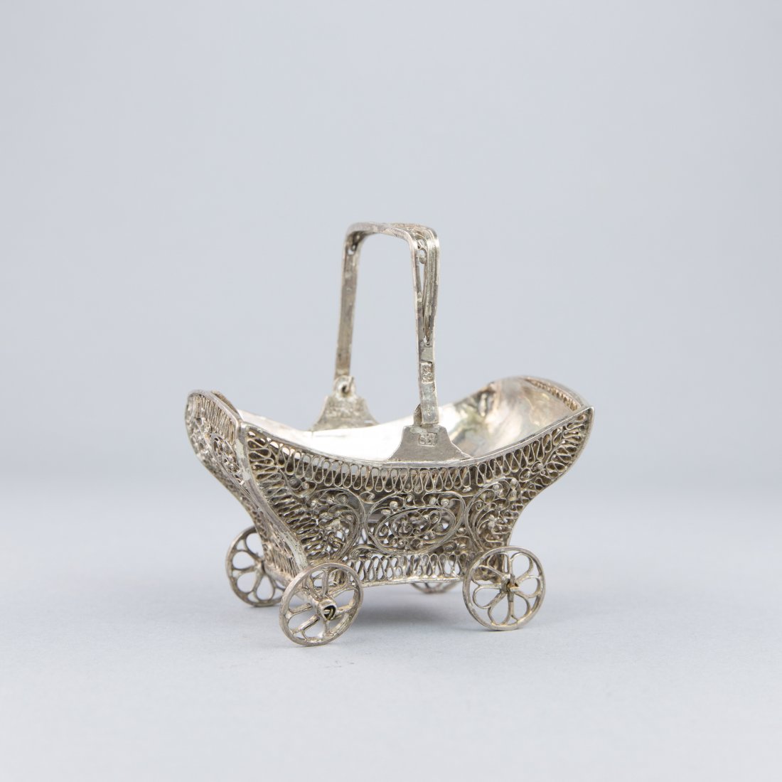 UKRANIAN SILVER CHAROSETH DISH: Ukraine, 19th Century, Zitomir, in the form of a carriage. Very fine filigree work. Fully marked and dated 1858, an early example for Zitomir. This was a Chasidic town famous for its Jewish press.Widt