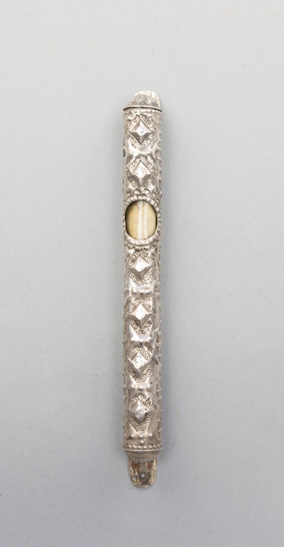SILVER ARTS AND CRAFTS MEZUZAH CASE: Austria-Hungary, circa 1910, repousse and chased silverLength 7.25"Provenance, Moriah Galleries, Recent Acquisitions, Winter-Spring 2013-2014, number 40