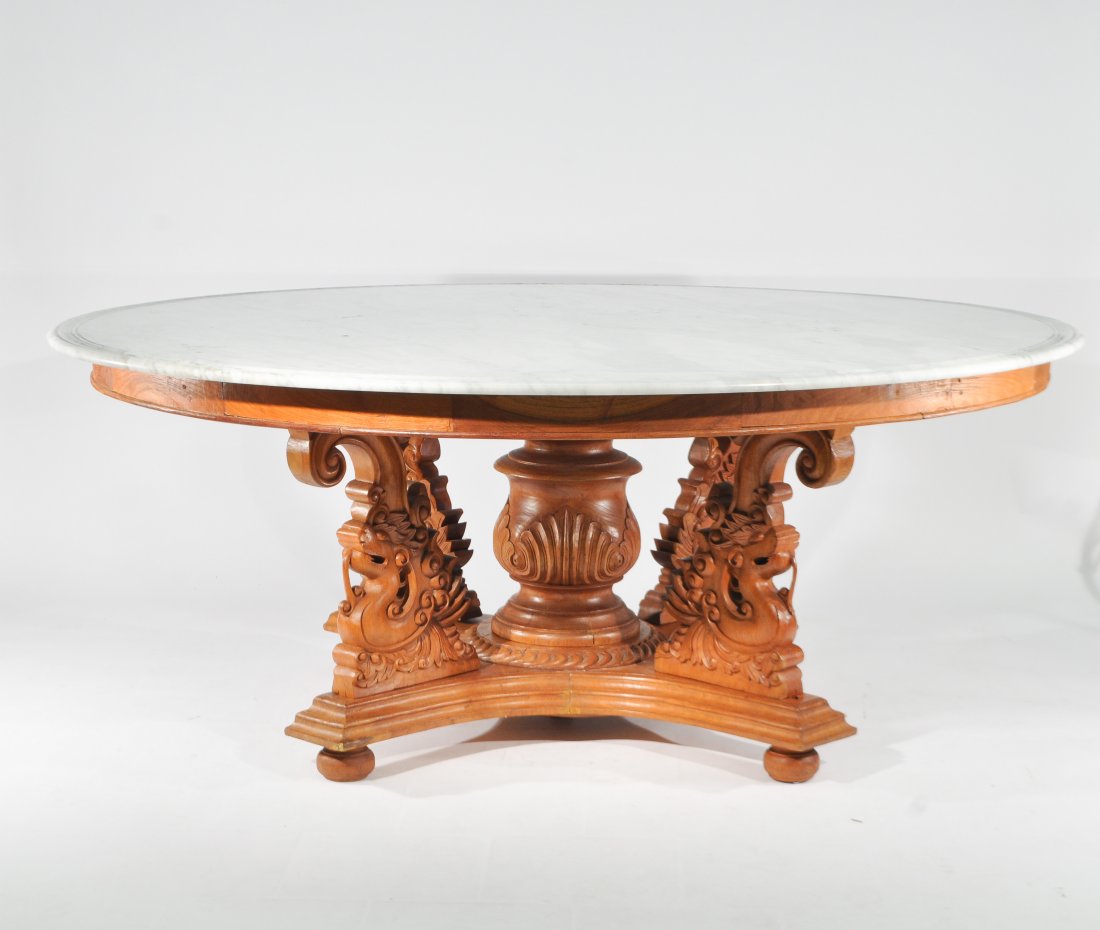 CARVED WOOD MARBLE TOP DINING TABLE: Dimensions: H 30" x Diameter 75"Condition: some restorations to base, repair to a crack that runs through marble top