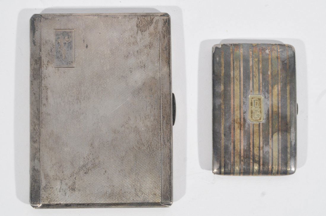 (2) SILVER CASES (1 of 7)