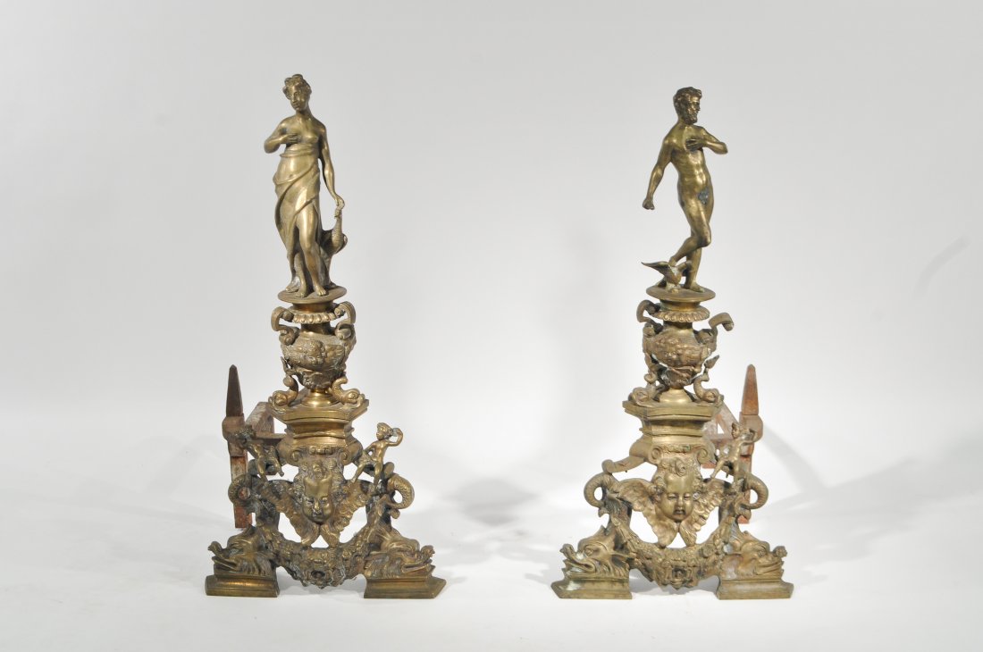 PAIR OF RENAISSANCE REVIVAL ANDIRONS: Cast bronze or brass in sections, circa 1880 Dimensions: H 30" x W 14" x D 26"