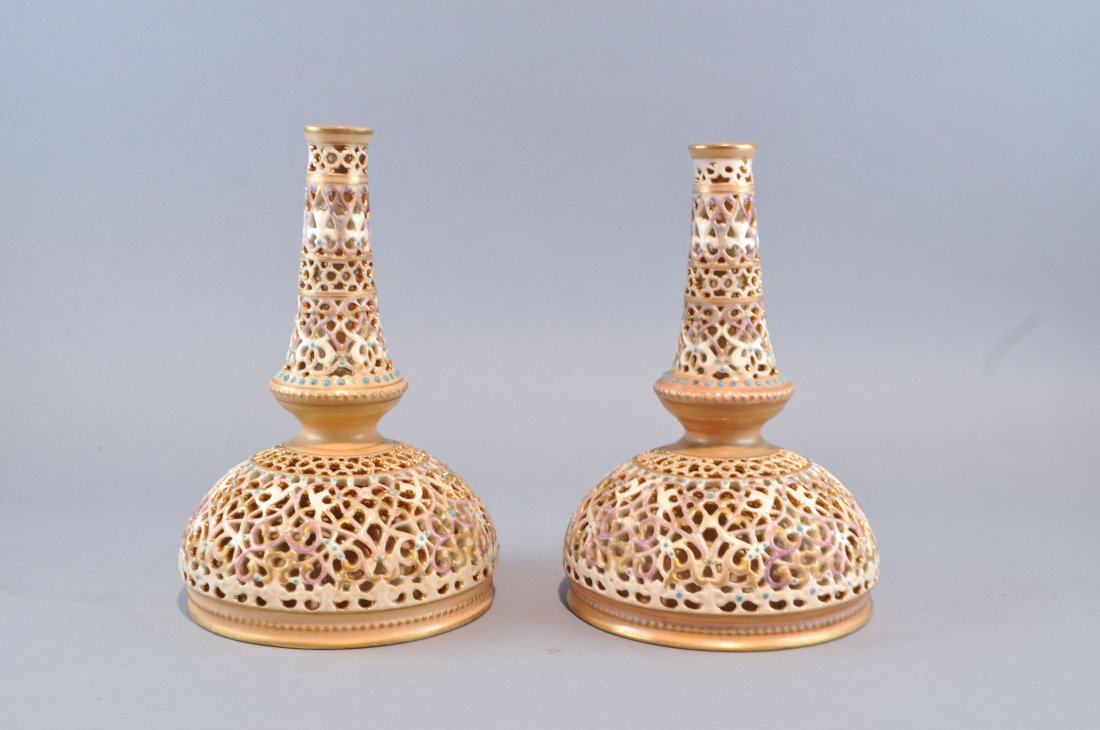 ZSOLNAY PECS PAIR OF BUD VASES: Reticulated lattice decoration, marked to bottom Dimensions: H 7" x Diameter 4.5"