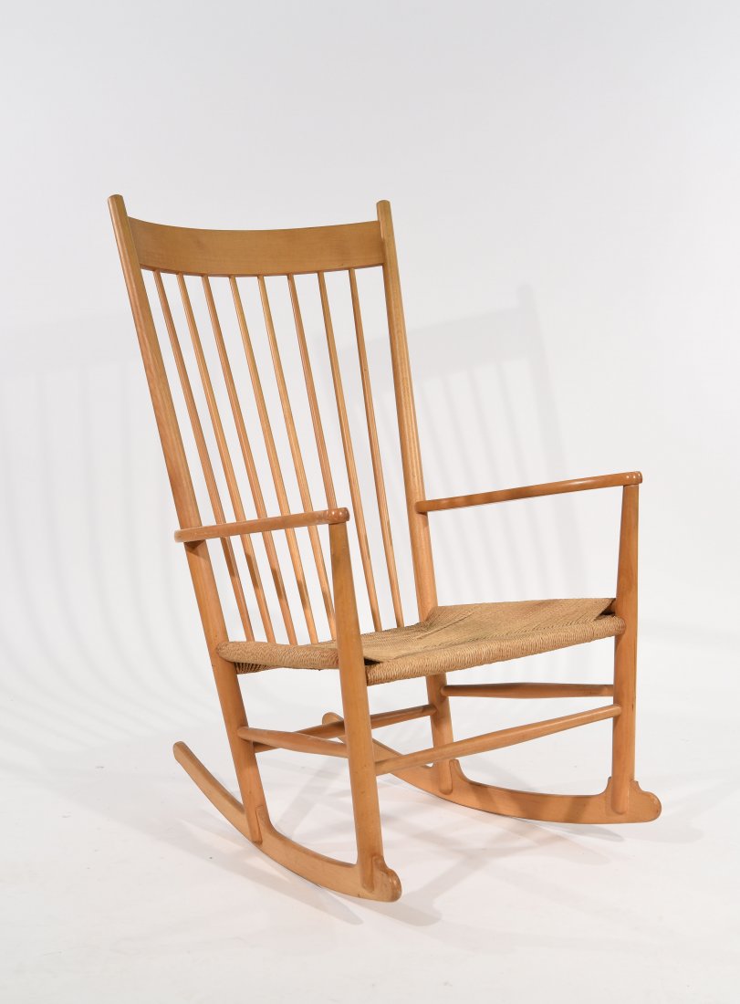 HANS WEGNER DANISH ROCKING CHAIR: Dimensions: H 43" x W 24.25" x D 30.75" Condition: good, cord seat is in fine shape, wood frame with some wear from use
